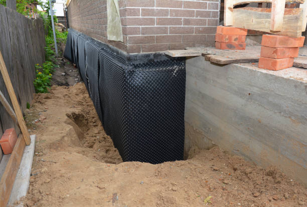 SJ Waterproofing Pros technician performing targeted Waterproofing assessment in Coal City, IL